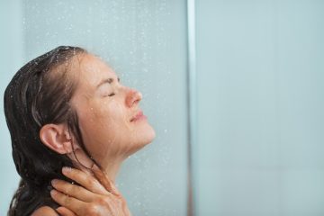 Portrait of woman taking shower